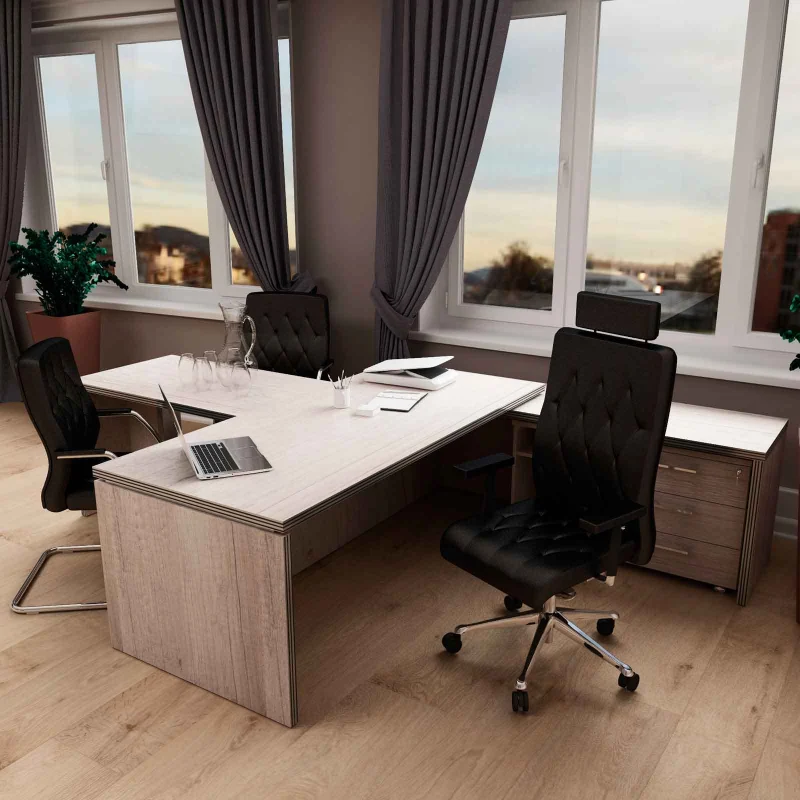 curtains frame a large window, adding a touch of elegance to this modern office space.